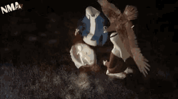 an aerial view of a nativity scene with a baby jesus in a manger surrounded by angels .