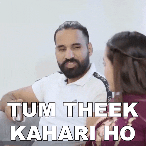 a man with a beard is talking to a woman and the words tum theek kahari ho are on the screen