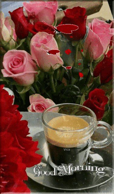 a cup of coffee sits on a saucer next to a bouquet of pink and red roses with the words good morning visible