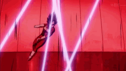 a person is flying through the air in a red room with purple lights coming out of the wall .
