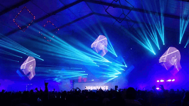 a crowd at a concert with the word resistance in the middle