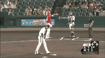 a baseball game is being played in a stadium with a glica ad in the background
