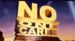 a sign that says no one cares is on a screen .