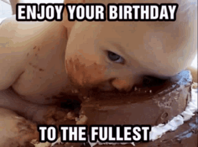 a baby is eating a chocolate cake with the words `` enjoy your birthday to the fullest '' written on it .