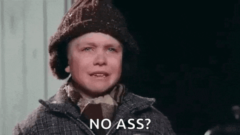 a little boy wearing a hat and scarf is crying and says `` no ass '' .