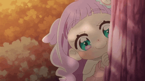 a cartoon girl with pink hair and blue eyes is peeking out from behind a tree