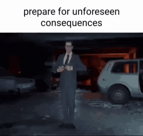 a man in a suit and tie is standing next to a car in a parking lot .