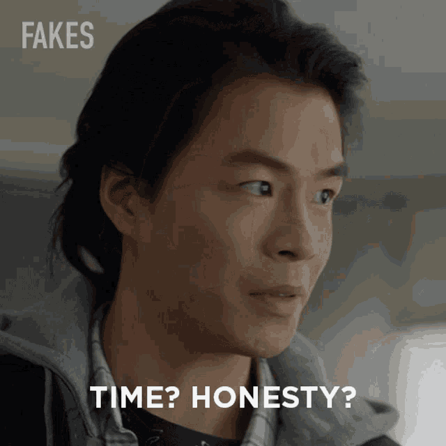 a man with fakes written on the top of his face