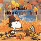 snoopy is wearing a pilgrim hat and holding a turkey on a thanksgiving card