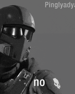 a black and white photo of a man wearing a helmet with the word no written on it