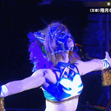 a woman in a blue and white outfit with a mask on her head