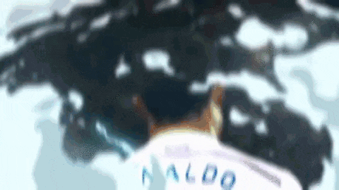 a blurry picture of a person 's back with the name naldo on it