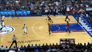a basketball game is being played in philadelphia at the wells fargo center