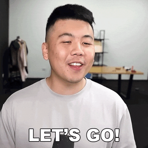 a man says let 's go in a gray shirt
