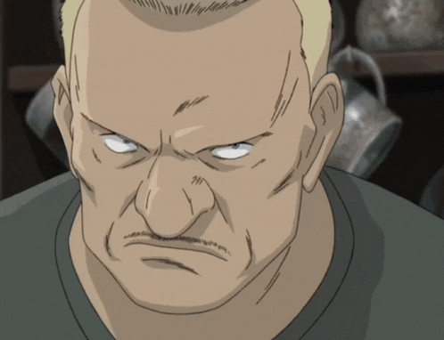 a cartoon of a man with a very angry face