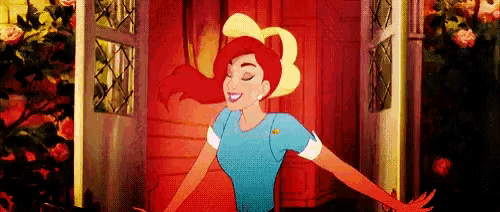 a cartoon woman with red hair and blonde hair is standing in front of a red door with her arms outstretched .
