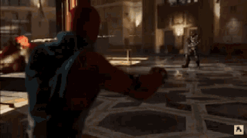 a red and blue spiderman is holding a statue of a turtle