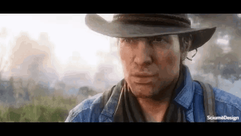 a close up of a man wearing a cowboy hat