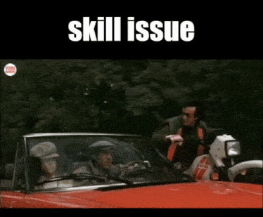 a man driving a red car with the words skill issue below him
