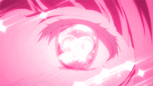 a close up of a pink anime character 's eye with a heart in it