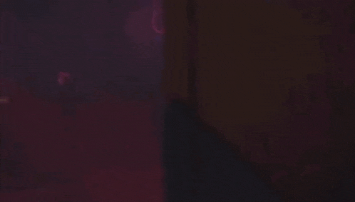 a cartoon character is surrounded by red lights and the words `` wheeze '' written on the bottom .