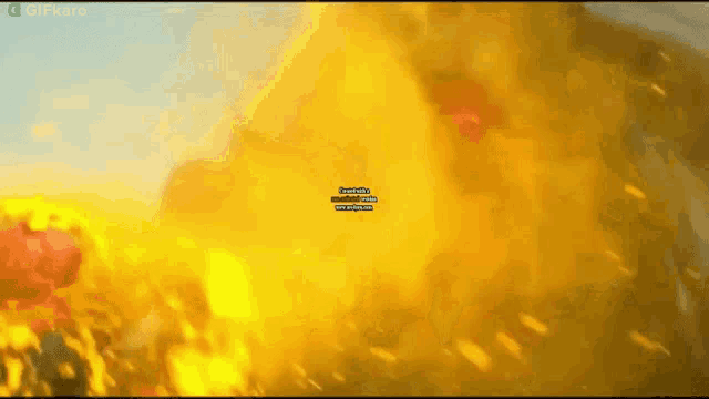 a screen shot of an explosion with a gifkaro logo in the corner