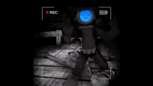 a black and white photo of a person 's face with a red circle around it .