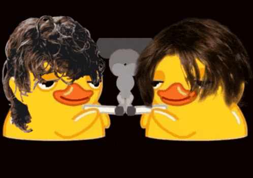 two rubber ducks are smoking cigarettes and one has a wig on