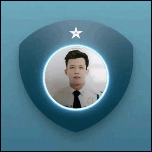 a man in a white shirt and black tie is in a blue shield with a star on it