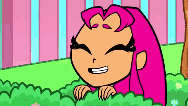 a cartoon character with pink hair is smiling while peeking out from behind a bush .