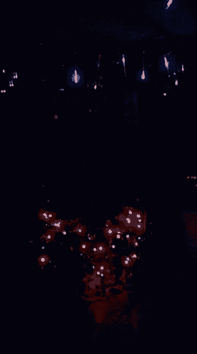 a dark room with a lot of red lights