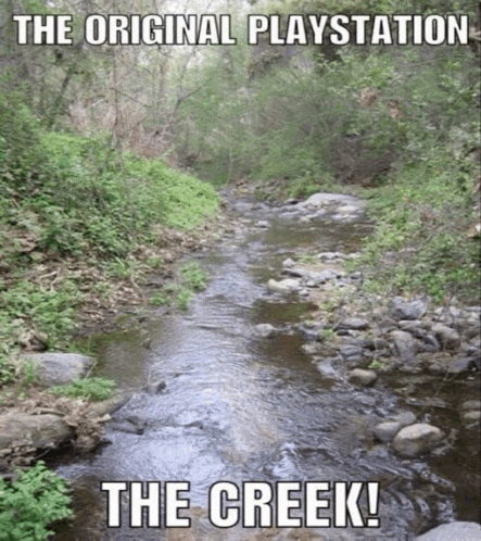 a river surrounded by trees and rocks with the caption " the creek "