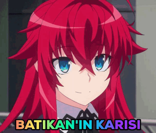 a picture of a girl with red hair and the words batikan 'in karisi below her