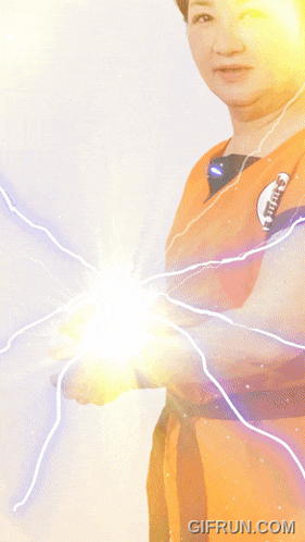 a woman in a dragon ball z costume with gifrun.com at the bottom of the image