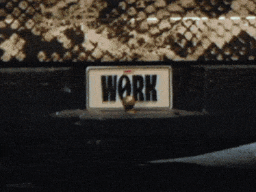a sign that says work is on a door