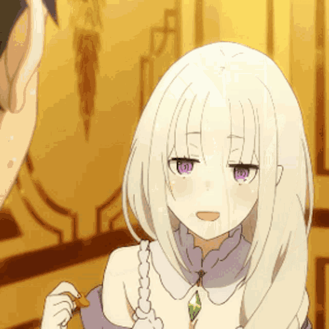 a girl with white hair and purple eyes is holding something in her hand