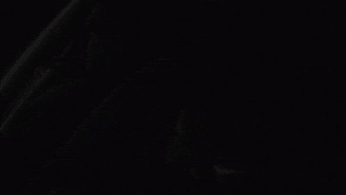 a black background with a white rectangle and the letter a