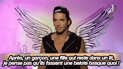 a man with wings on his shoulder is talking in french