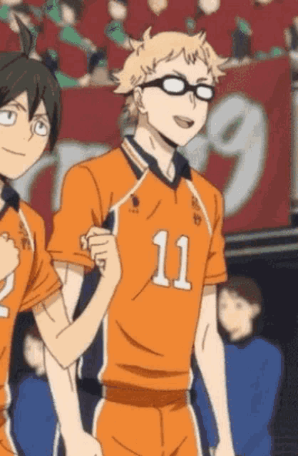 a couple of anime characters are standing next to each other . one of the characters is wearing glasses and a number 11 jersey .