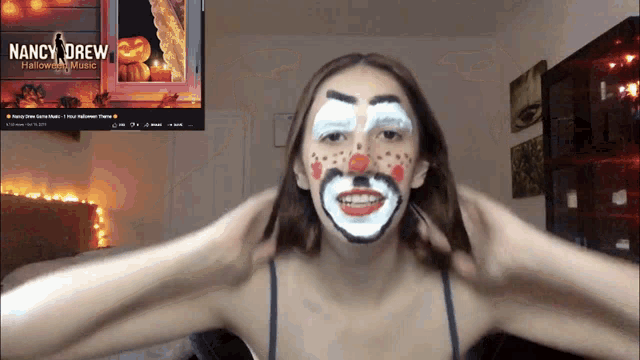 a woman with a clown face painted on her face and a nancy drew halloween music poster behind her