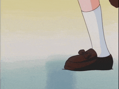 a cartoon girl with a yellow bow in her hair is crying