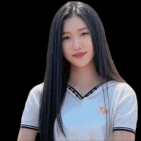 a young woman with long black hair is wearing a white shirt and smiling .