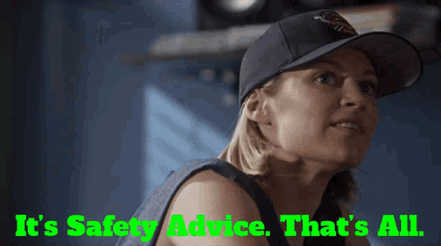 a woman wearing a hat with the words " it 's safety advice that 's all " below her