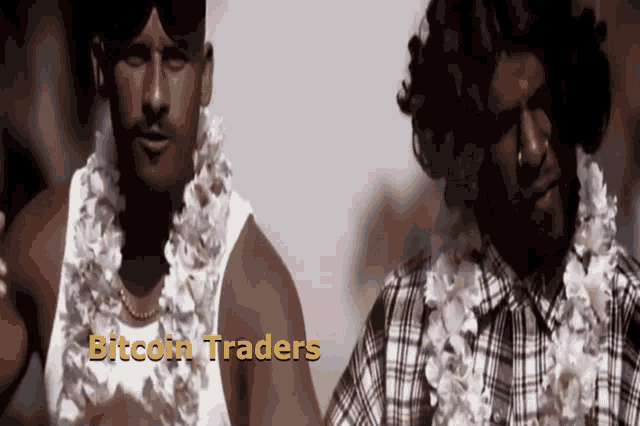 two men wearing flowers around their necks and the words bitcoin traders on the screen