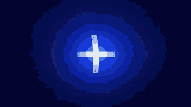 a blue light is shining brightly in the dark .