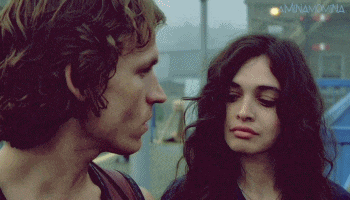 a man and a woman are looking at each other and the man says well you know i like traveling too