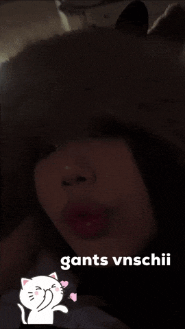 a girl wearing a furry hat with the words gants vnschii on the bottom right