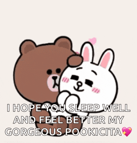 a brown bear and a white rabbit are hugging each other