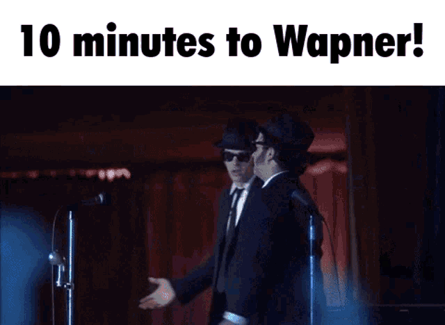 two men standing next to each other with the words 10 minutes to wagner