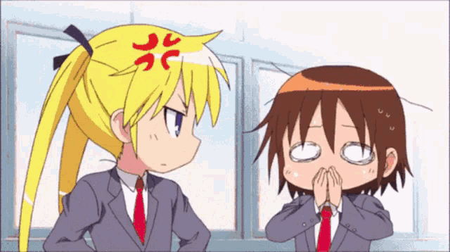 a girl with a red heart on her head is angry